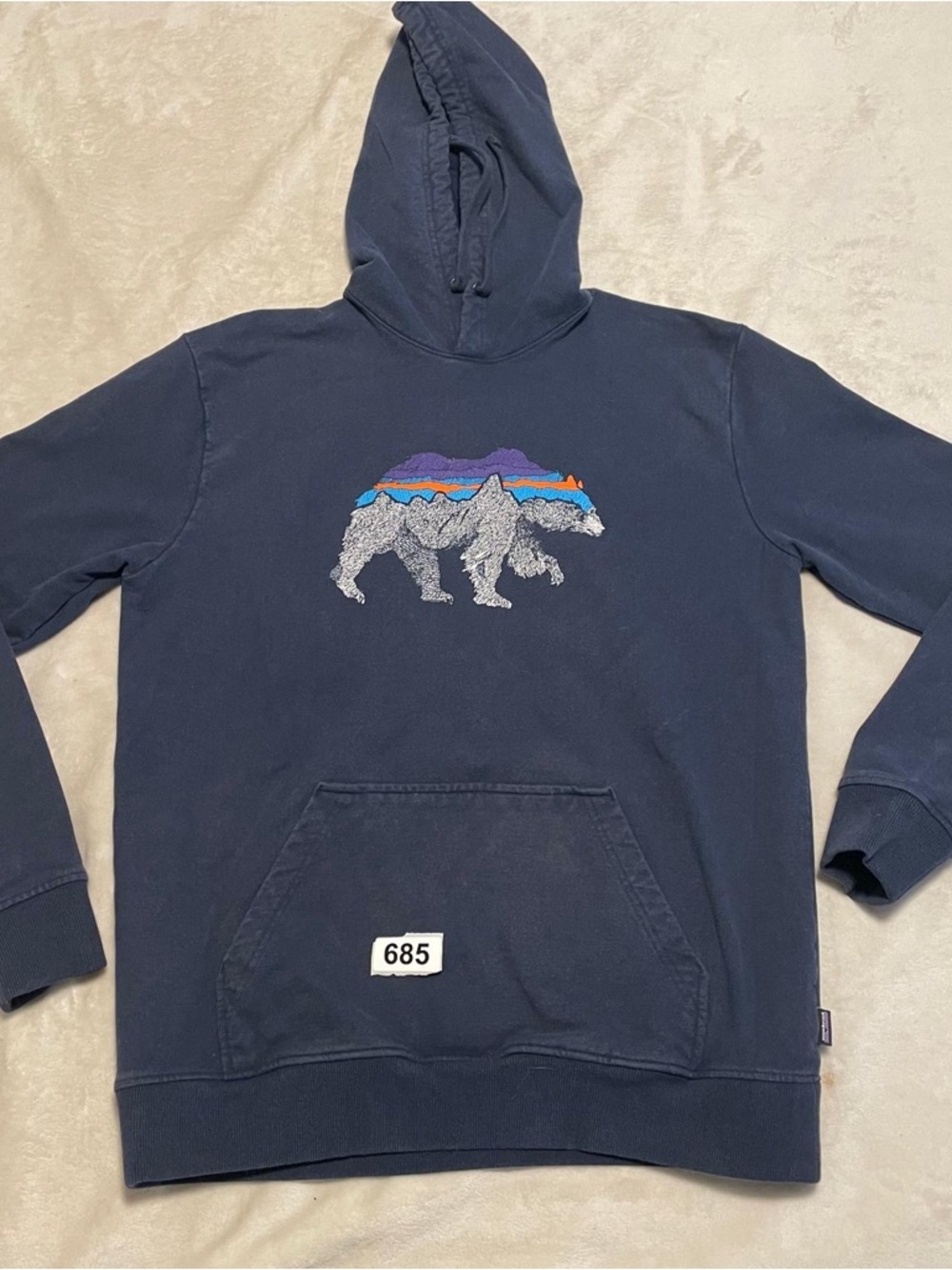 Patagonia Navy Hoodie with Multicolor Mountain Bear Patch